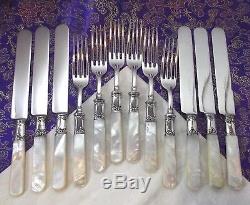 Landers Frary & Clark Mother of Pearl Handle 12 Pc Flatware Set withSterling Bands