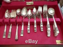 Oneida community coronation silverplated flatware 75pc. Set for 12(extra pieces)
