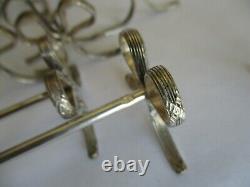 Set of 12 Silverplate Knife Rests, METAL ARGENTE GH, France, Bow withCross Bands
