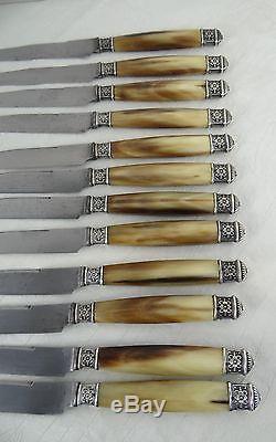 Set of 12 antique French horn handled entremet knives, silver bands