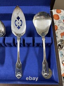 Set of 55 Pieces Oneida Community Silver Shell Silver Plate & Stainless Flatware