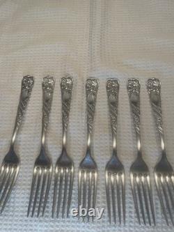 Set of 7 -1891 ROGERS BROS XII Siren pattern 7 FORK -no monogram