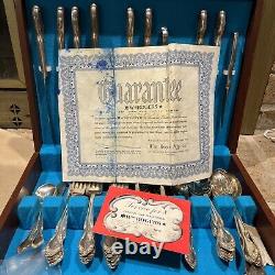 WM Rogers Silverplate flatware 55 Pieces And Wood Case