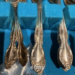 WM Rogers Silverplate flatware 55 Pieces And Wood Case
