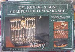 WM. Rogers & Son Enchanted Rose Goldplated Flatware Set 63 piece NIB